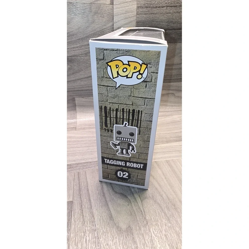 Funko Pop! Banksy Tagging Robot Brandalised Debate 02